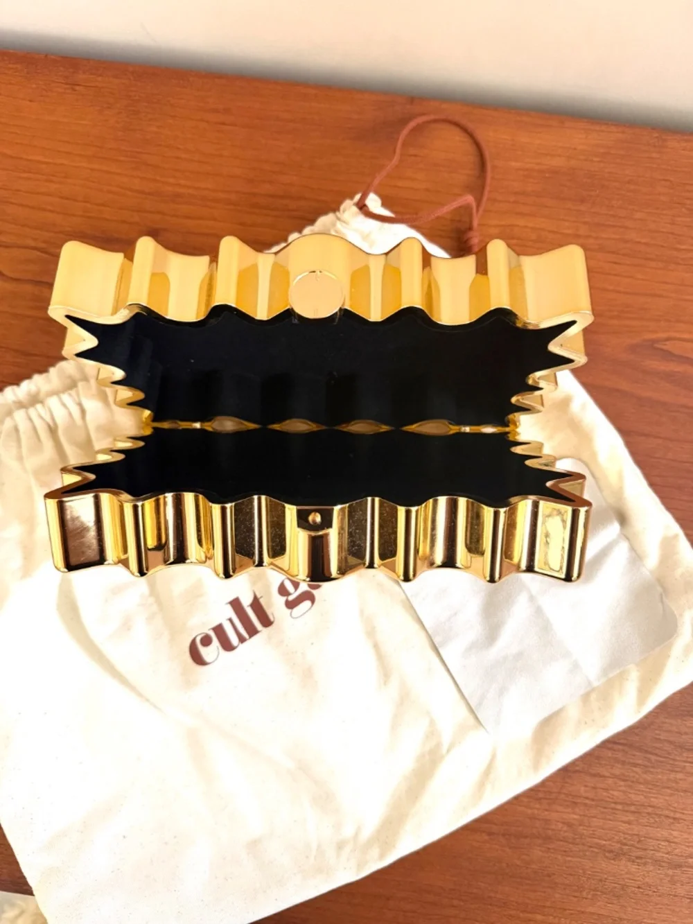 Gold Cult Gaia clutch